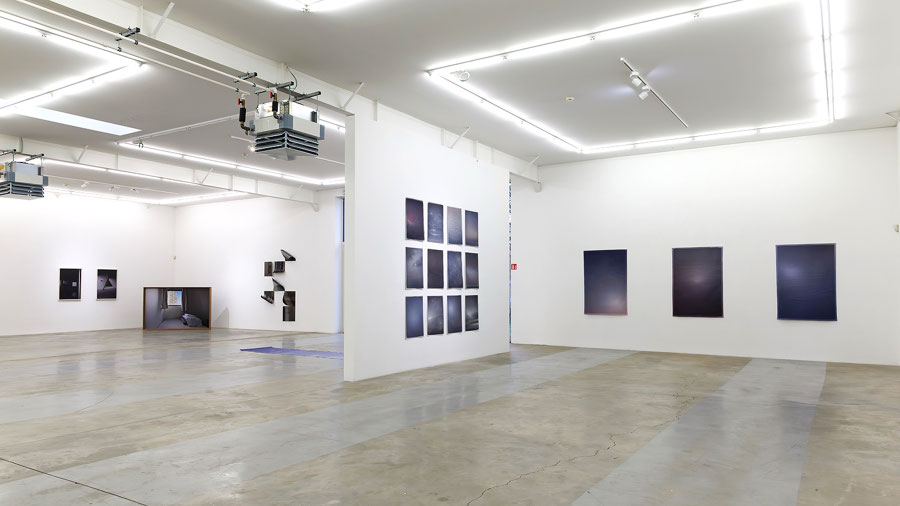 View of the ENTREVUE[S] exhibition in Luxembourg, featuring works by Aurélie Pétrel (left) and David Raffini (right).